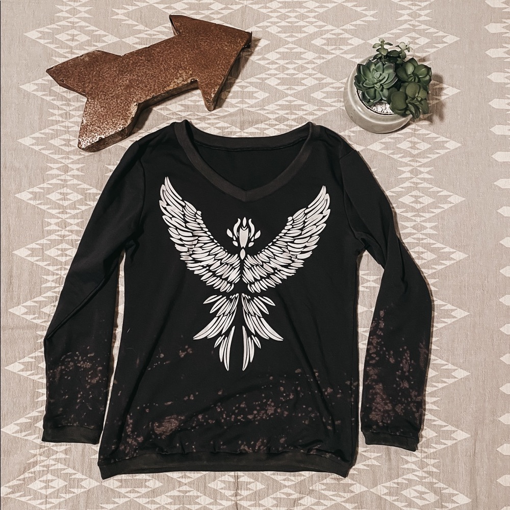 Bleached and Distressed Free Bird graphic sweater